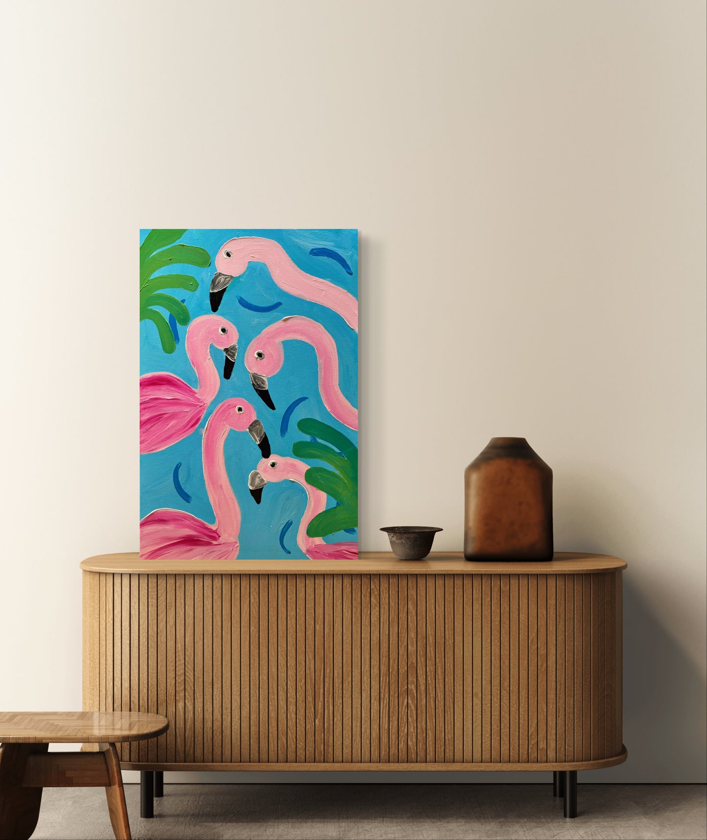 Five pink flamingos